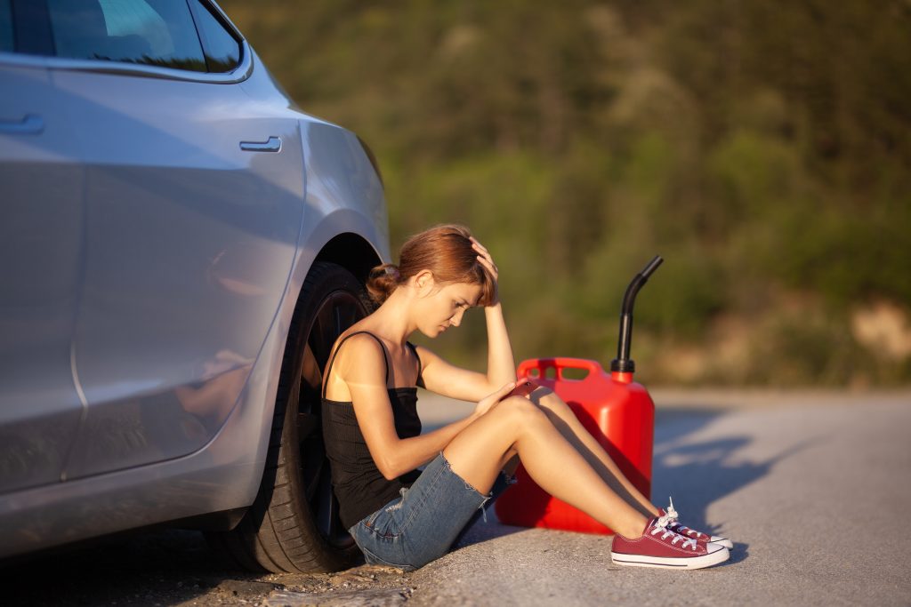 Woman waiting at roadside for an Onsite Fuel Refuelling Solution